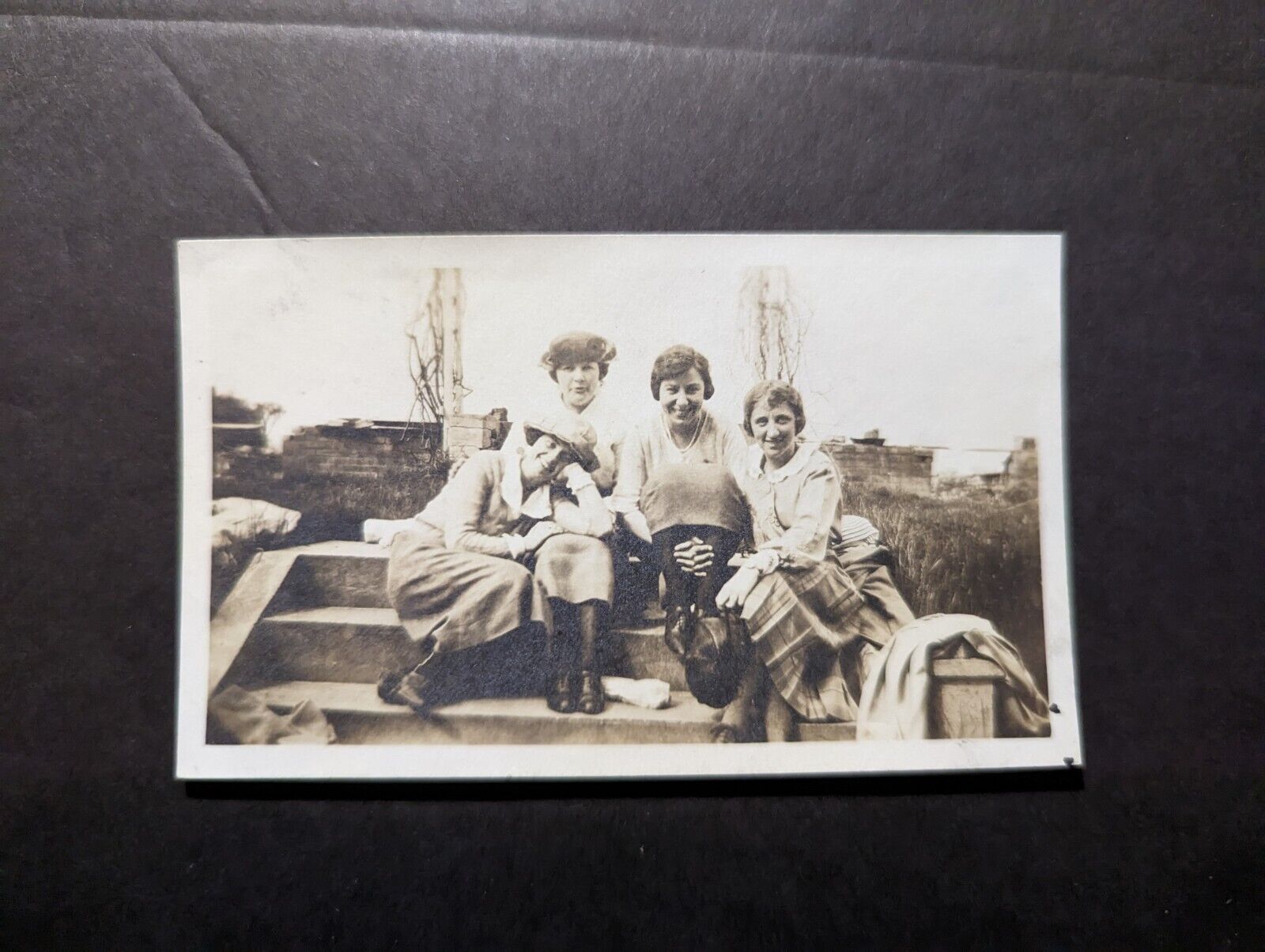 Mint RPPC Postcard Group of Smiling Women Sitting on Stairs Steps