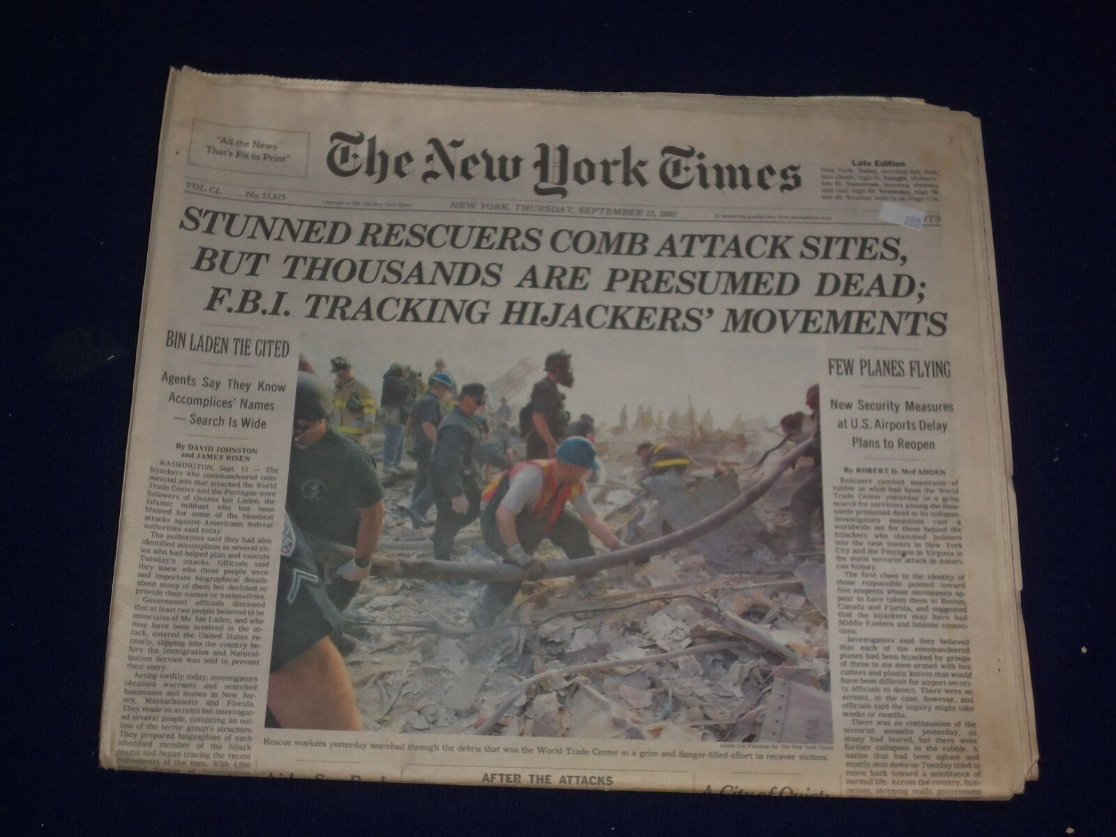 2001 SEPTEMBER 13 THE NEW YORK TIMES-STUNNED RESCUERS COMB ATTACK SITES- NP 3027