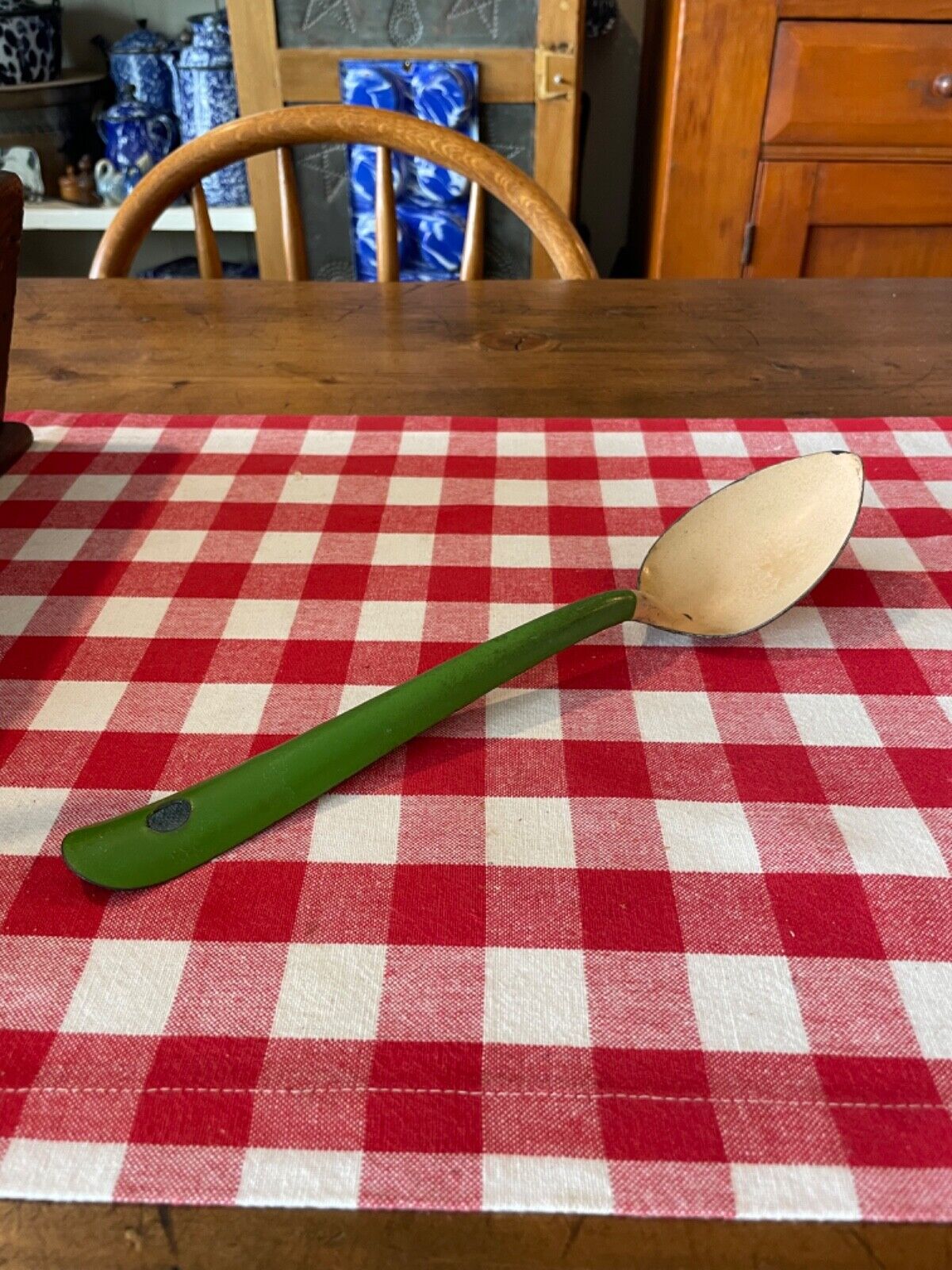 Antique Cream and Green Graniteware Spoon (11 1/2 inches long)