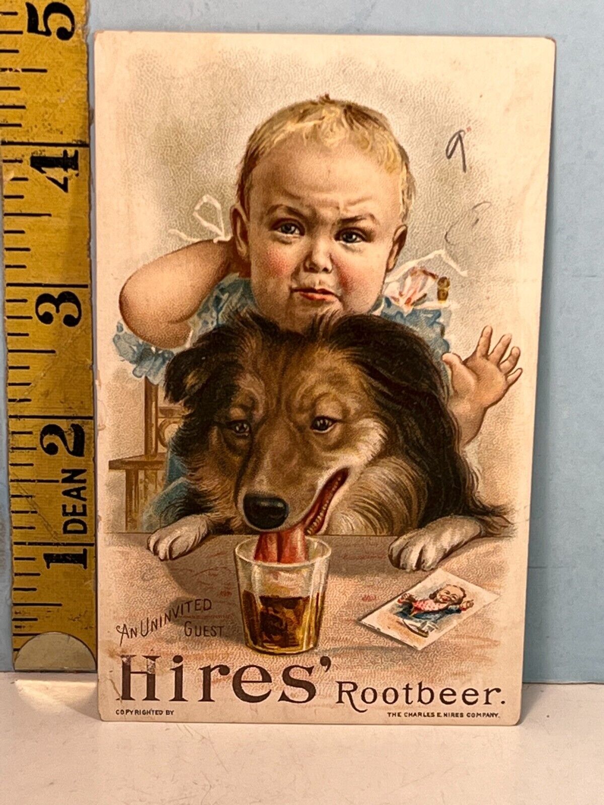 1800\'s The Charles E. Hires Co Trade Card featuring Dog stealing from sad Baby.