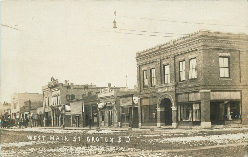 c1910 Groton South Dakota Brown West Main Street View Cassels RPPC Postcard