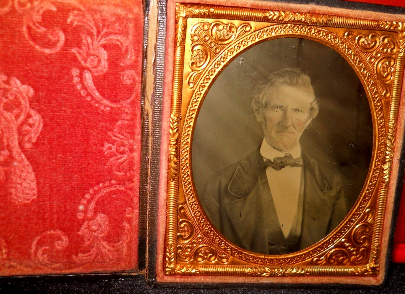 1/6th Size Ambrotype of man in full case, split at hinge