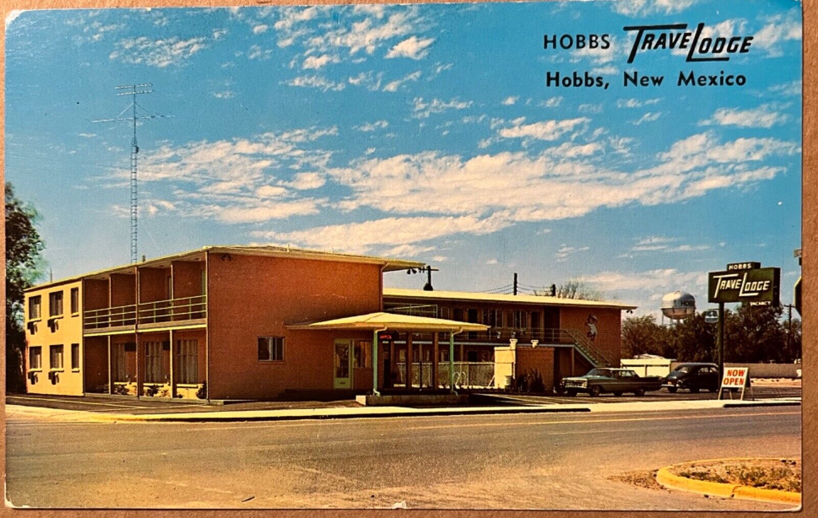 Hobbs New Mexico Travel Lodge Motel Water Tower Old Cars Vintage Postcard c1960