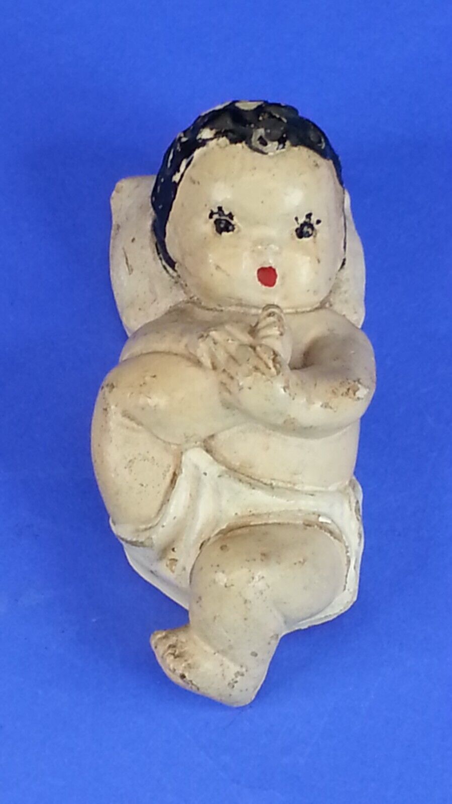 Antique Baby Playing With Foot Figure