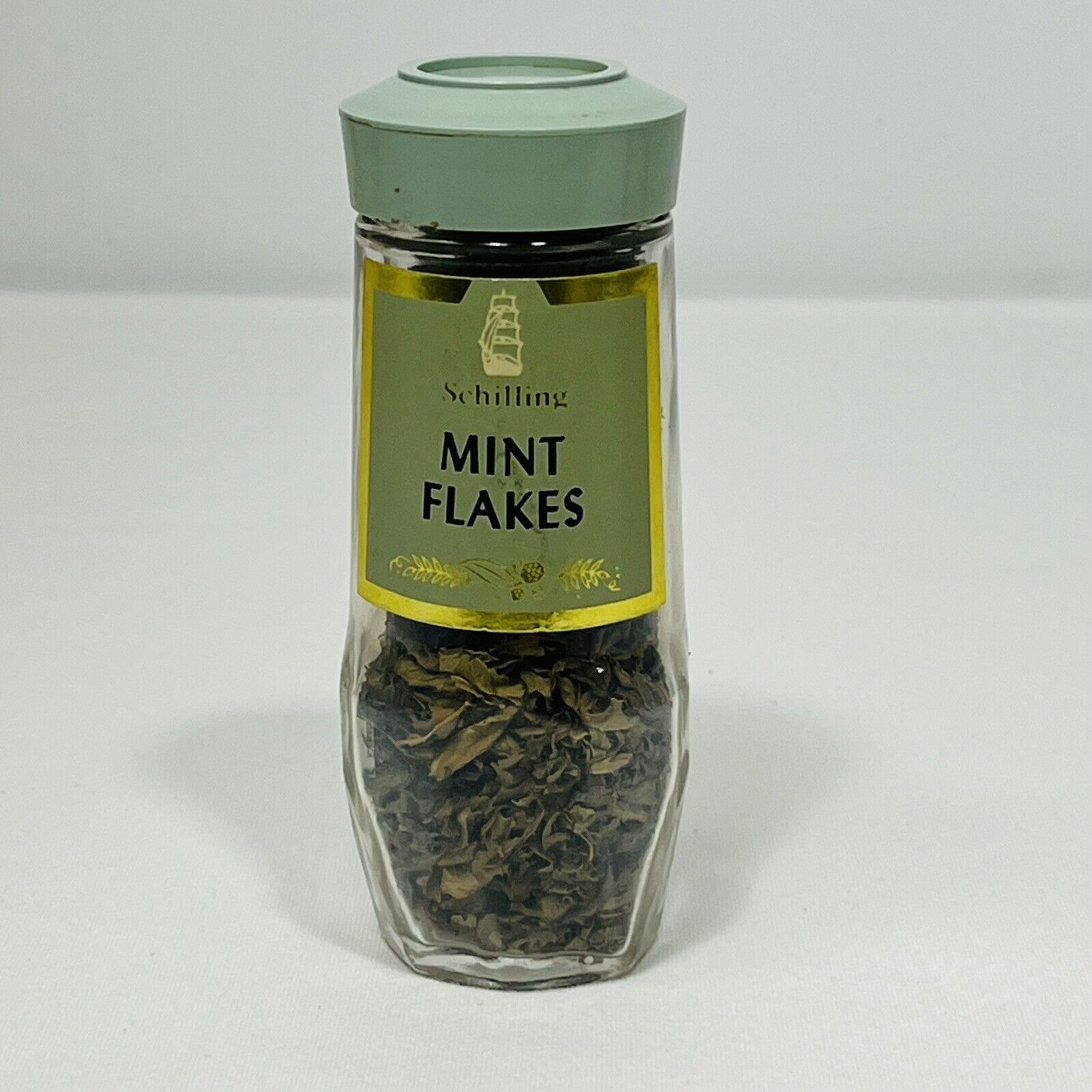 Schilling McCormick Mint Flakes Glass Bottle Green Lid Vintage