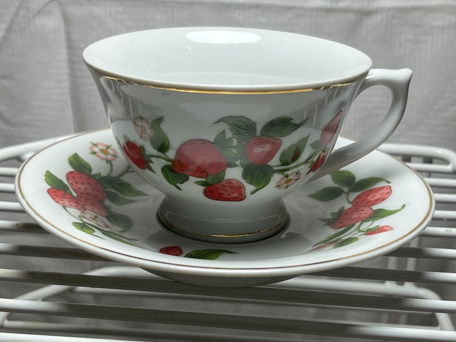 One (1) Teleflora Strawberry Flower Tea Cup and Saucer