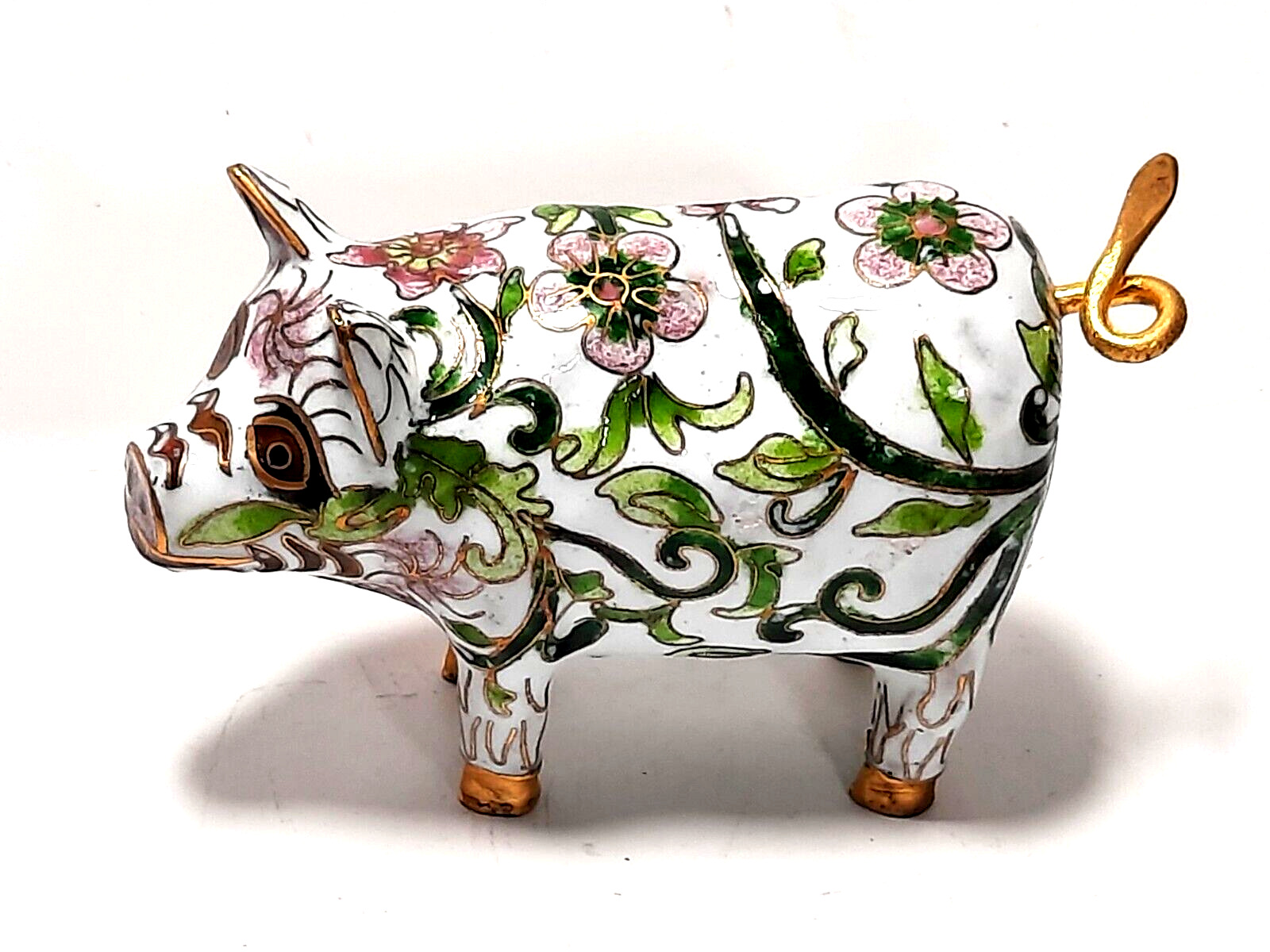 Brass and enamel floral decorated pig pre-owned
