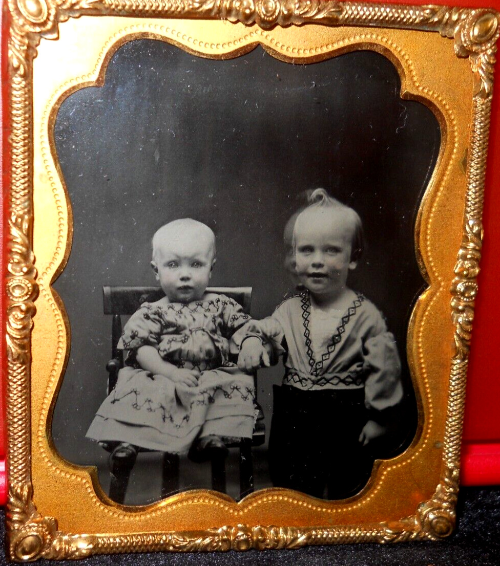 1/6th Size Tintype of siblings in brass mat/frame