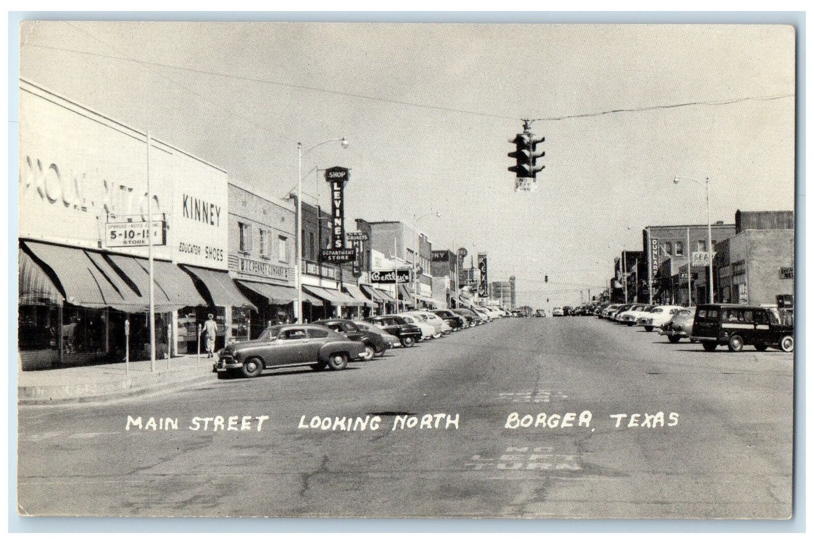 c1950 Main Street Looking North Hanging Stoplight Cars Borger Texas TX Postcard
