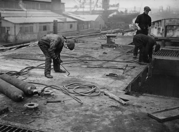 Workmen cutting through the deck of HMS Lion with acetylene tor- 1925 Old Photo