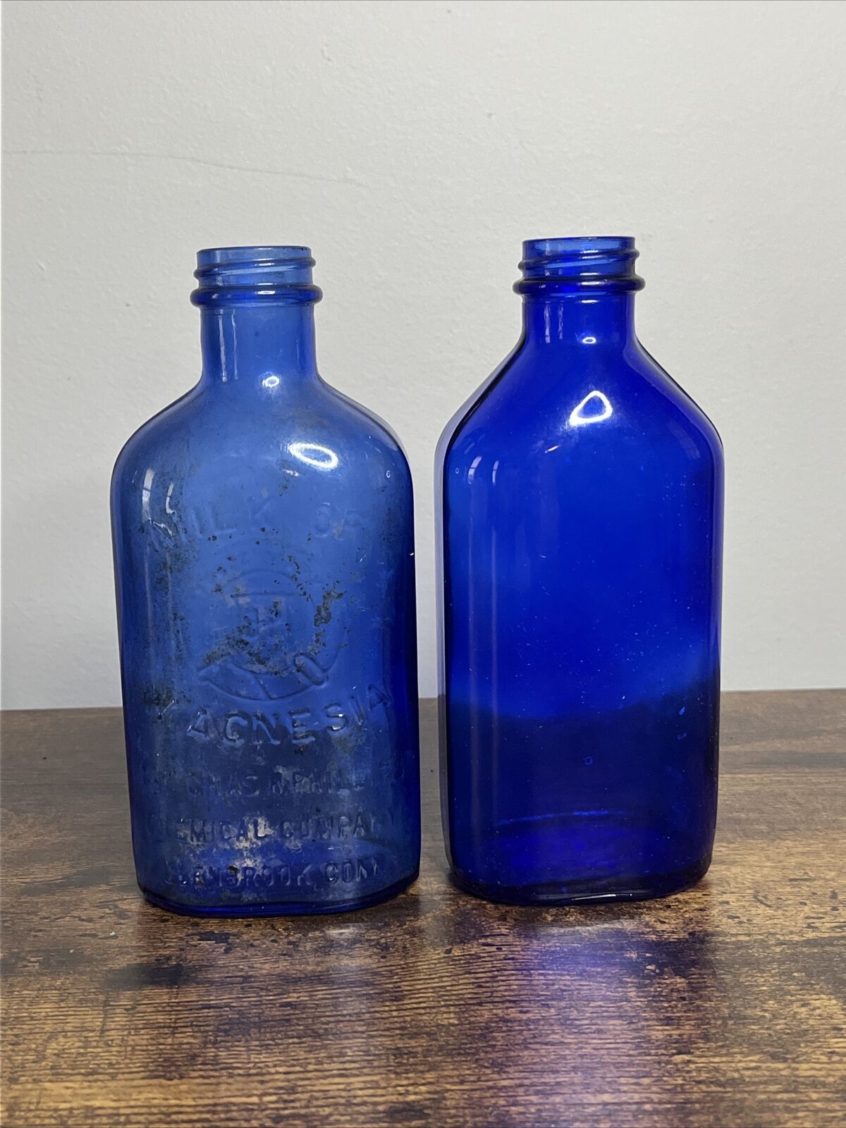 2 Vintage Phillips Milk of Magnesia Cobalt Blue Glass Embossed Bottles