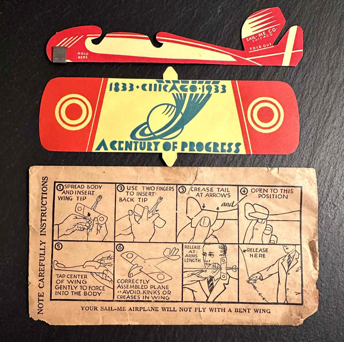 1933 WORLD FAIR CHICAGO PAPER AIRPLANE TOY AND INSTRUCTION ENVELOPE D208