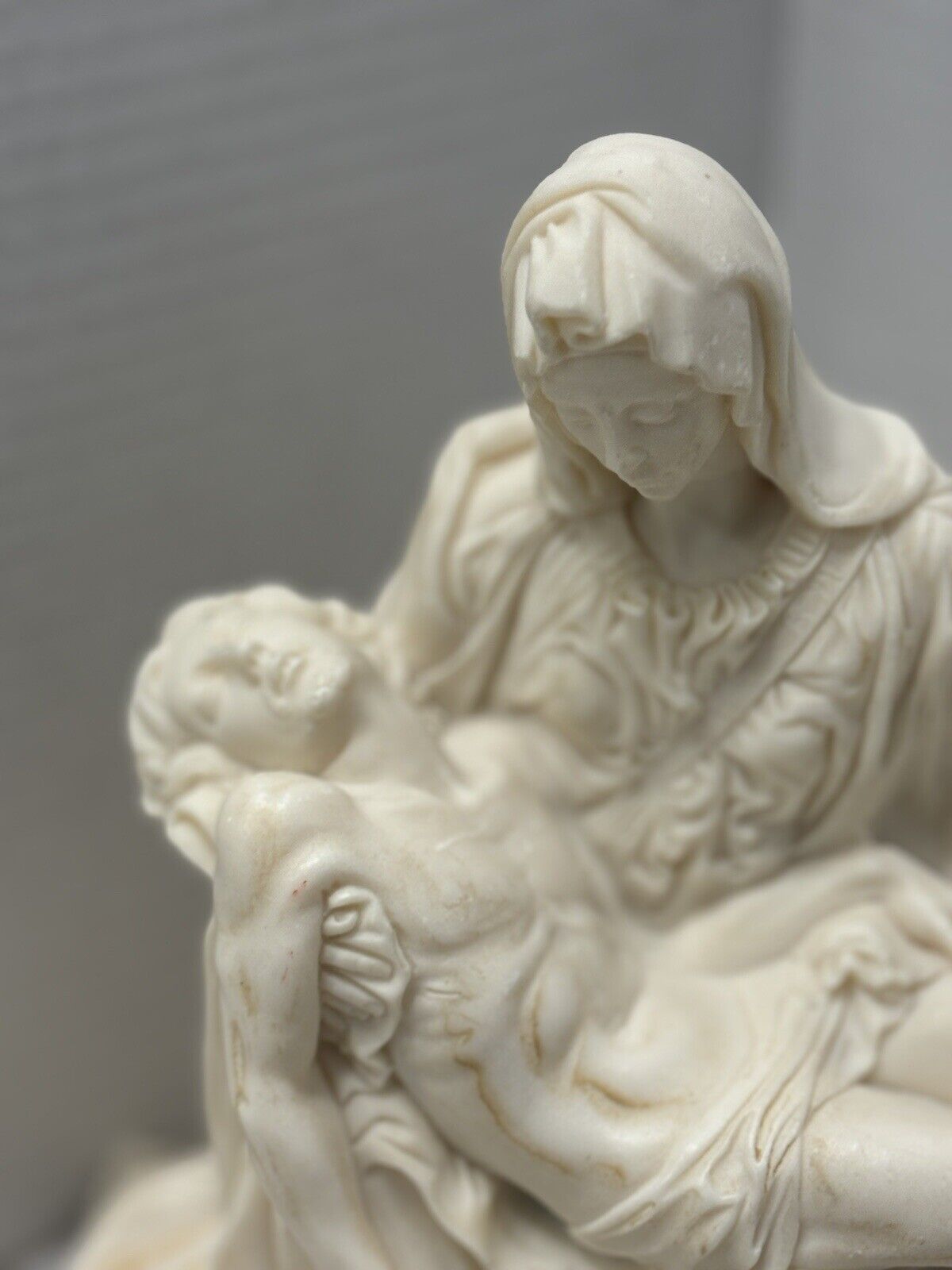 “The Pieta” By Michelangelo Marble Base Ceramic Cream Carved Sculpture Preowned