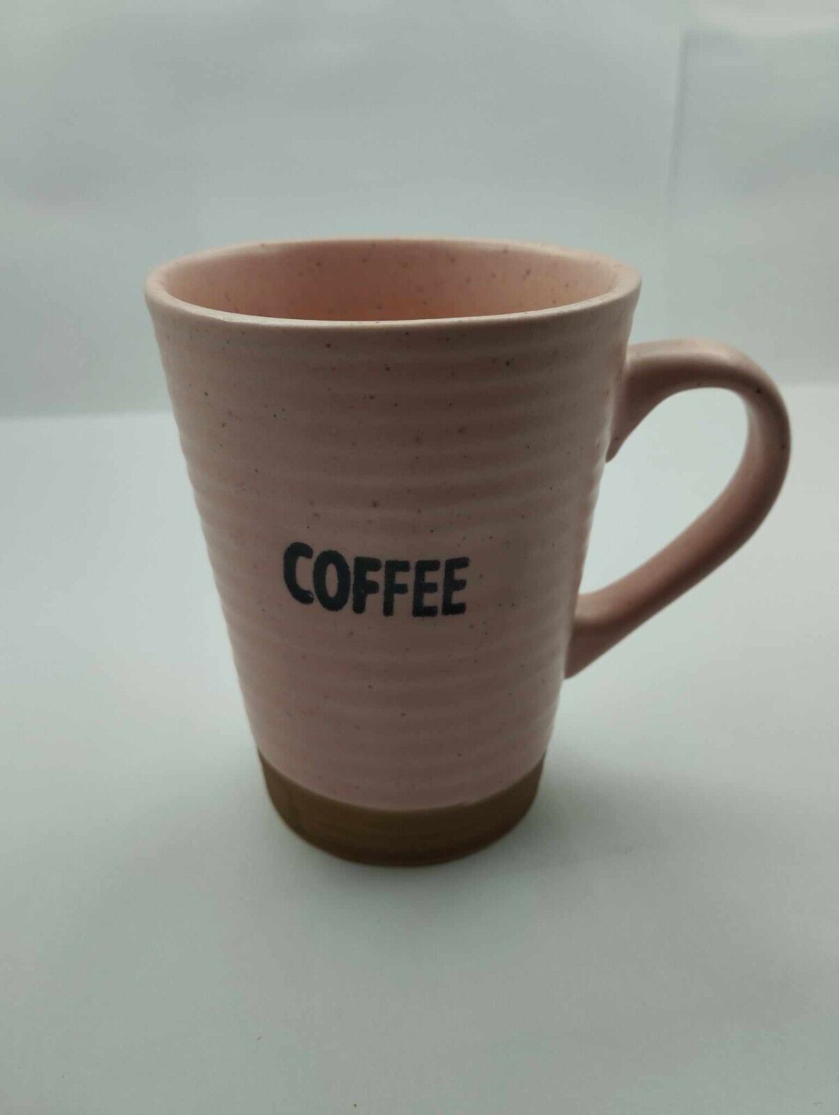 Ceramic pink and brown coffee cup