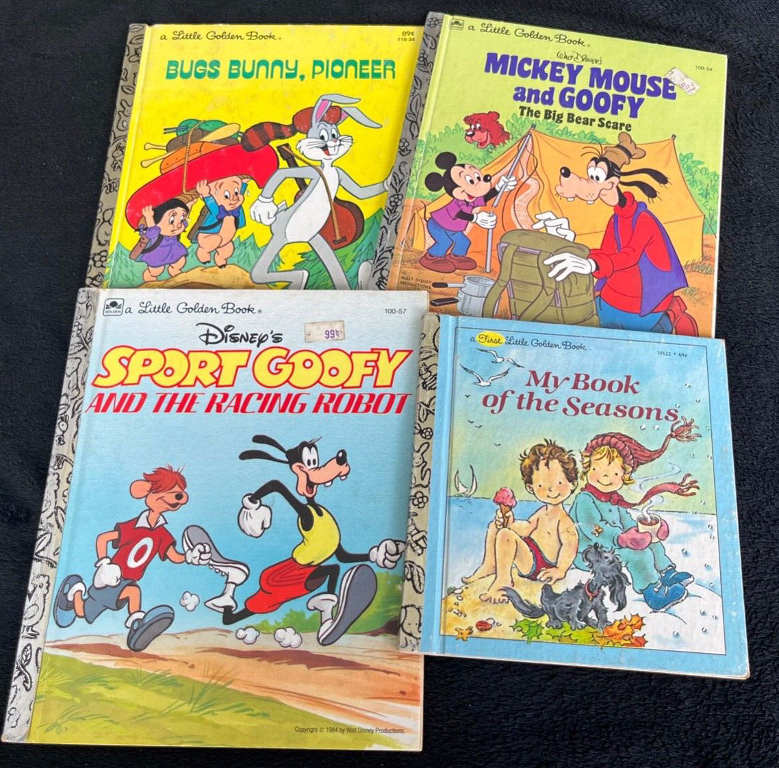 Lot of 4 A Little Golden Book Bugs Bunny Sport Goofy Mickey Mouse and Seasons