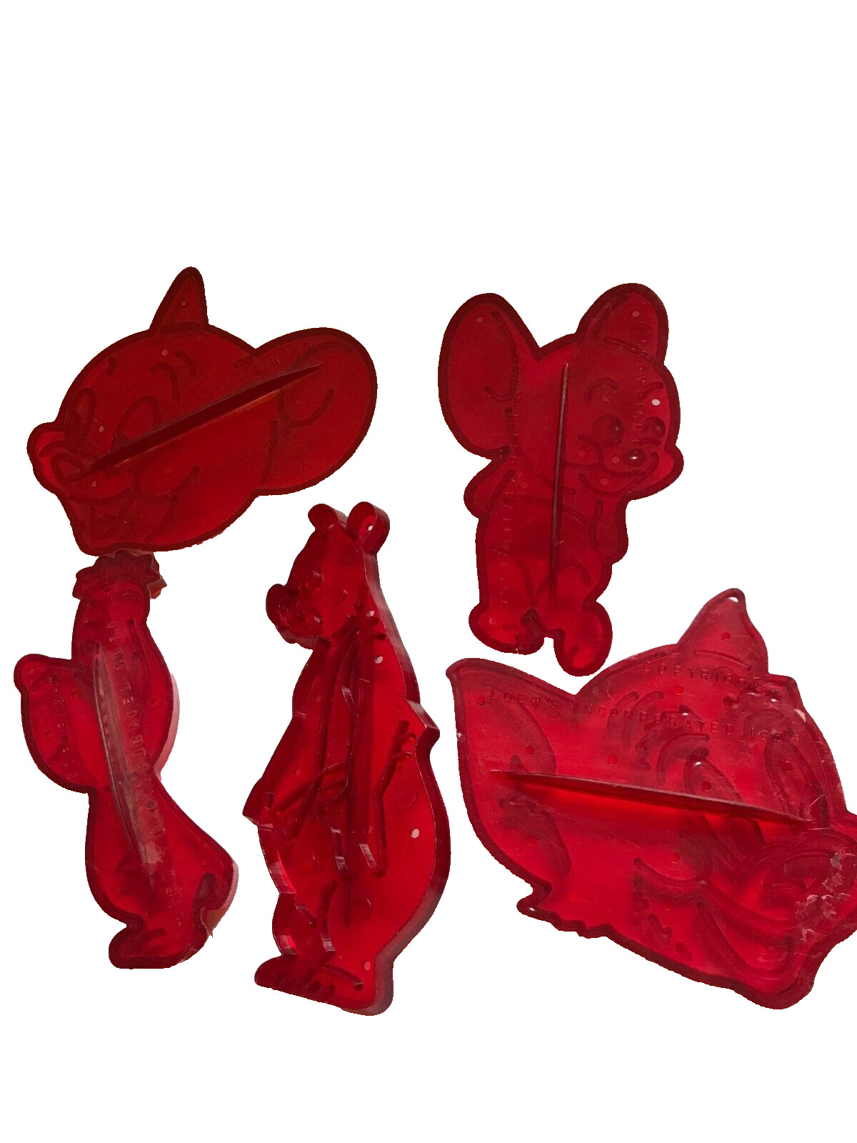 SET OF 5 1956 LOEW'S RED PLASTIC COOKIE CUTTERS