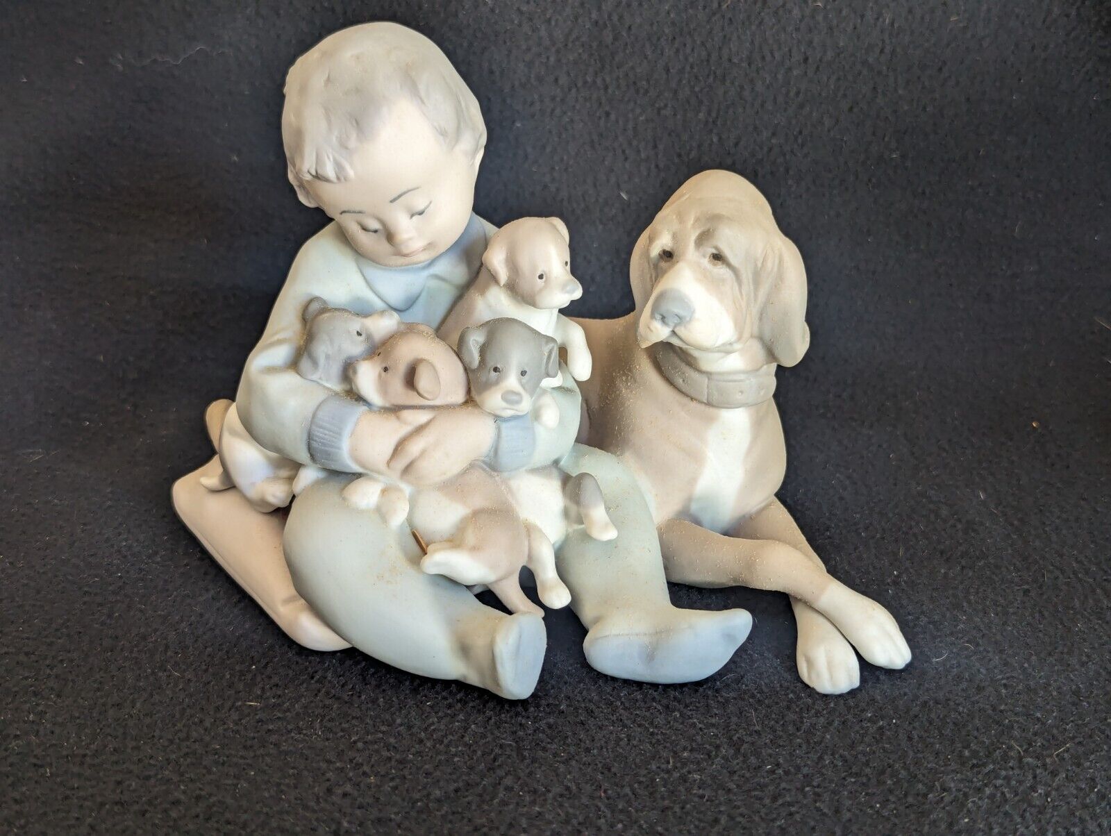 Lladro “New Playmates” # 5456 Boy with Puppies Porcelain Figurine Matte finish