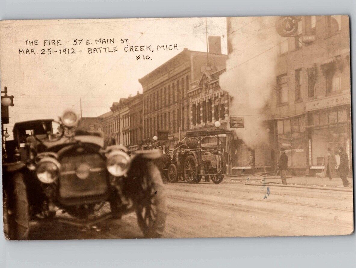c1912 Fire On Main Street Fire Trucks Battle Creek Michigan MI RPPC Postcard