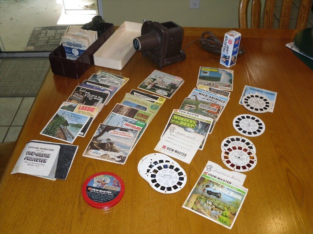 vintage view-master reel sets with projecter and viewer