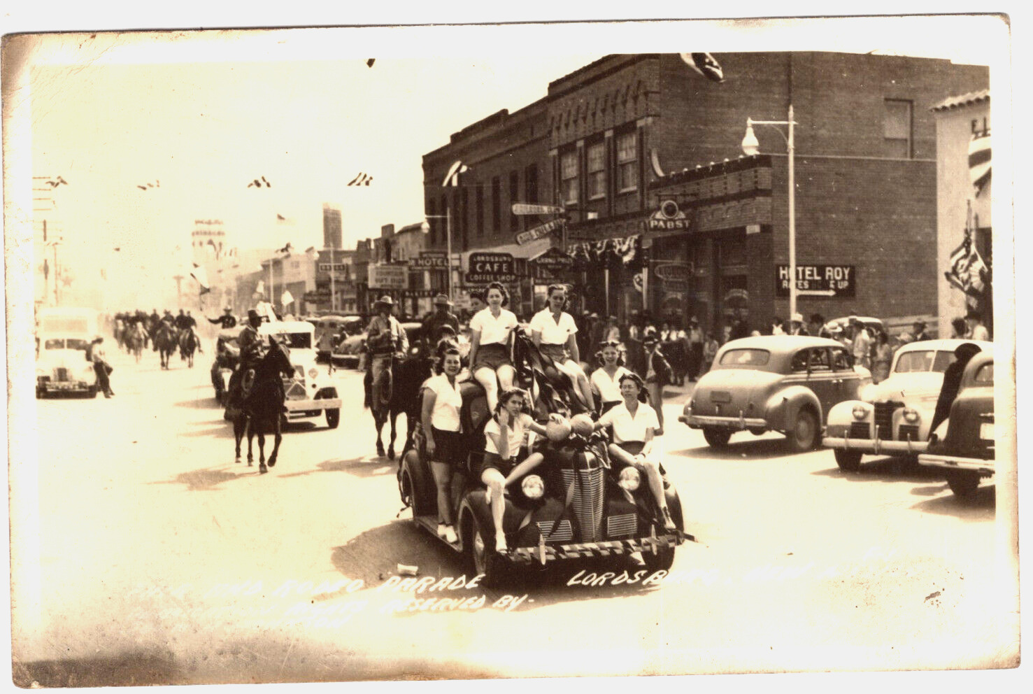 Vintage Postcard NM Lordsburg RPPC Rodeo Parade Girls Horses 40s Cars Shop -4572