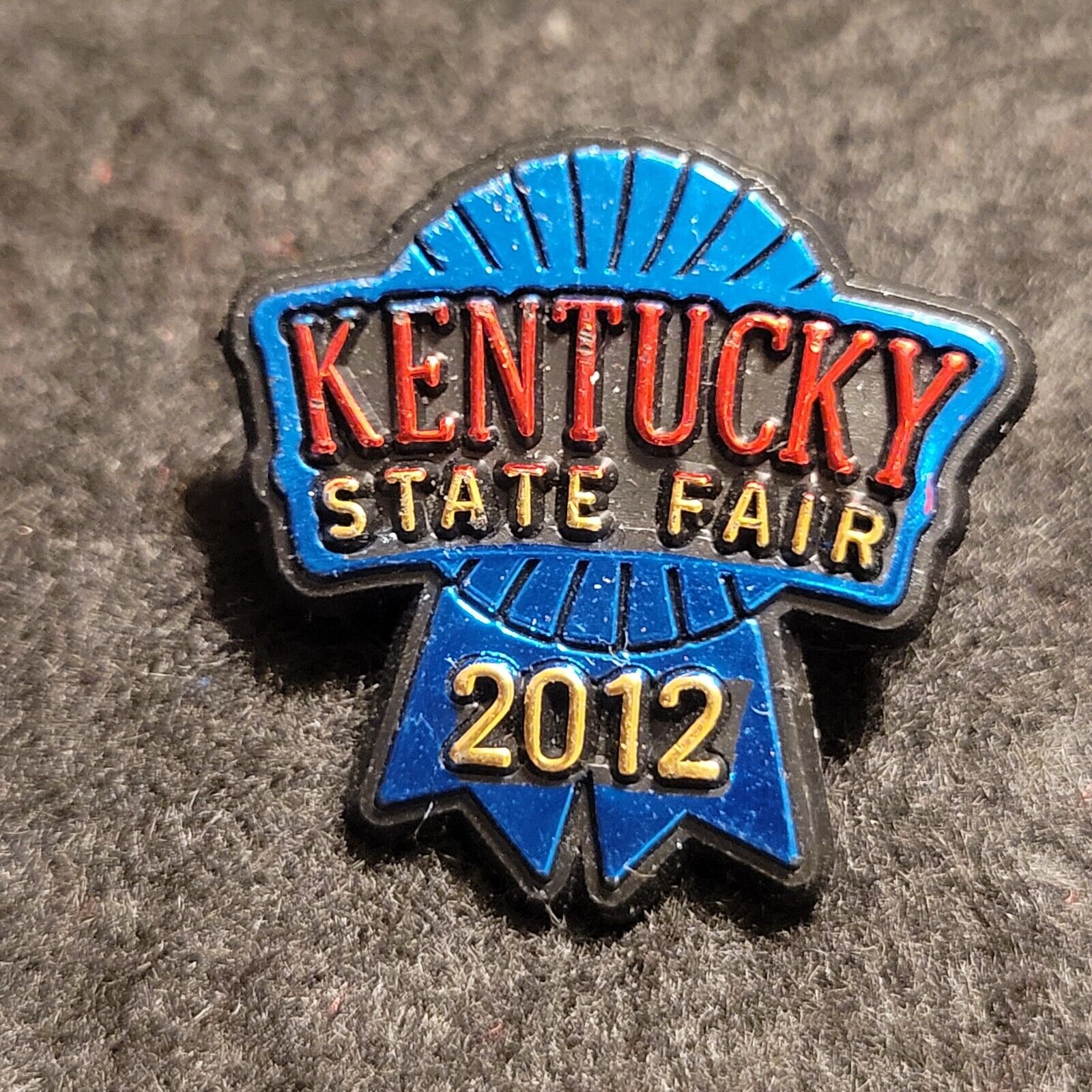 2012 Kentucky State Fair Ribbon Plastic Souvenir Lapel Hat Vest Pin Black KY