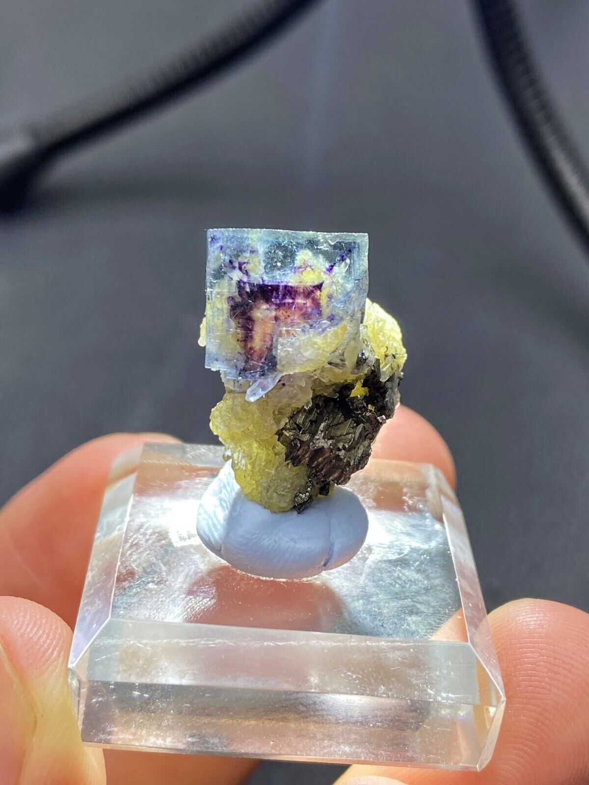 Unique natural purple core transparent blue cube fluorite crystal coated bismuth