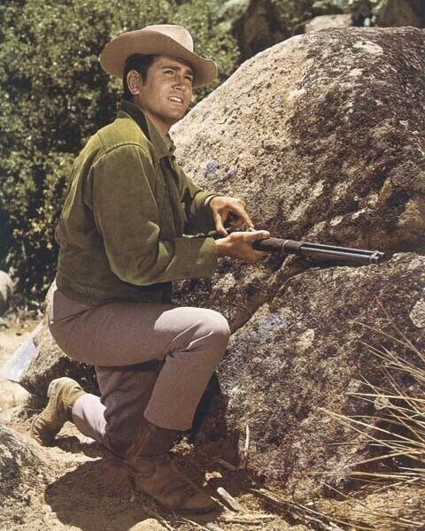 Michael Landon 1960\'s Bonanza kneeling by rock loading rifle 24x36 inch poster