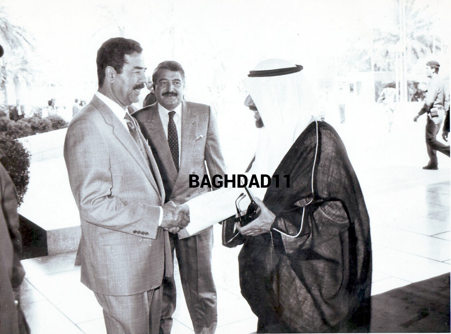 Kuwait-Iraq. Reprinted photo Sheikh Jaber Al Ahmad Al Sabaha with Saddam.  1990