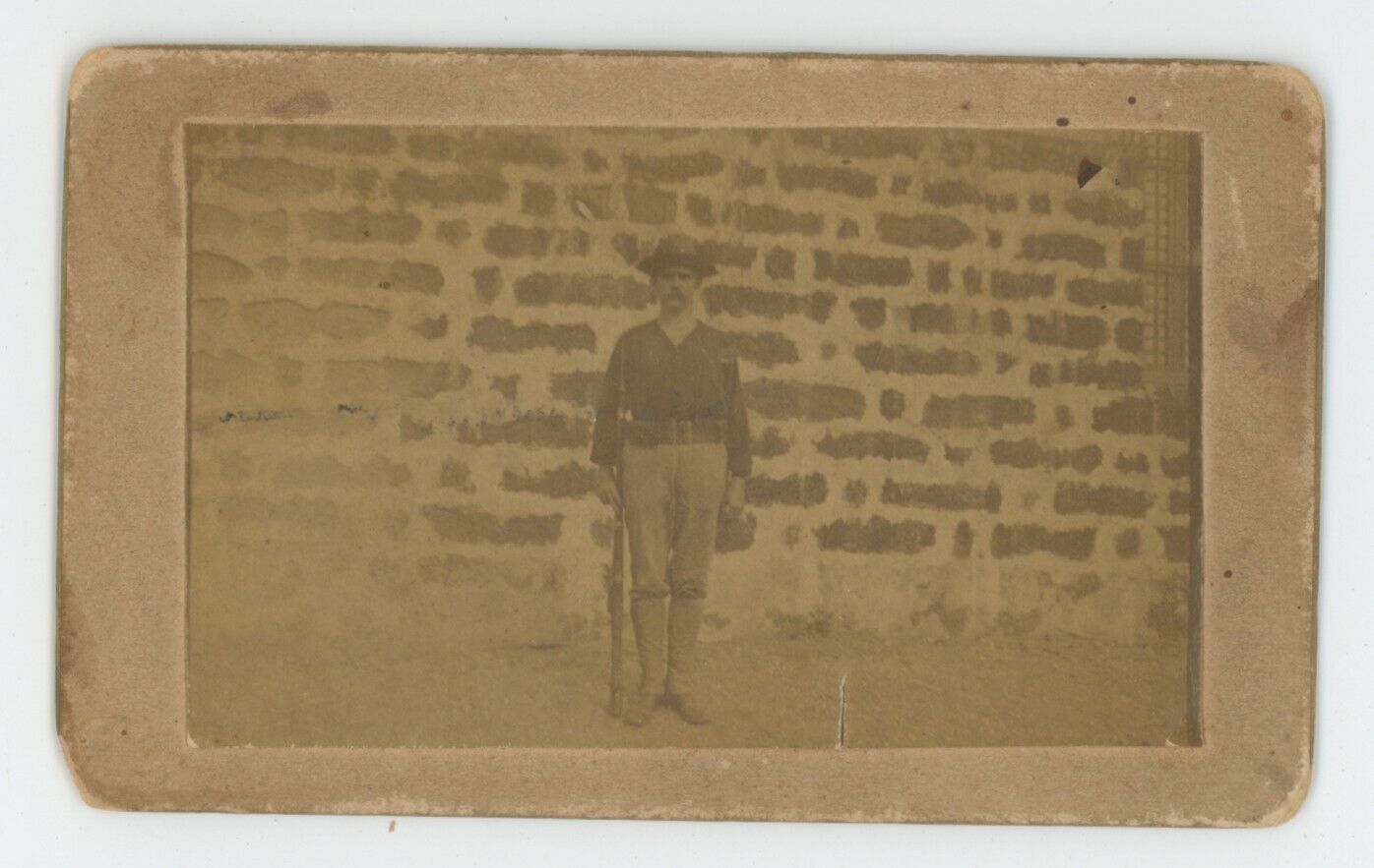 Antique CDV Circa 1900s Incredible Image of Soldier With His Gun by Brick Wall