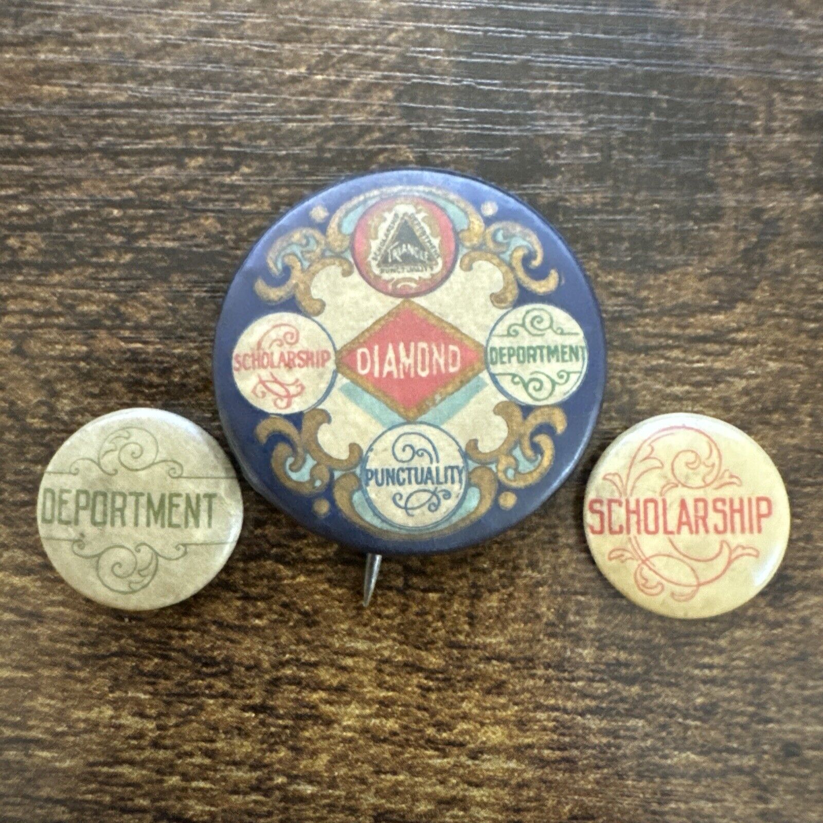 Antique 1902 Triangle Diamond + Scholarship & Deportment Celluloid Pinbacks