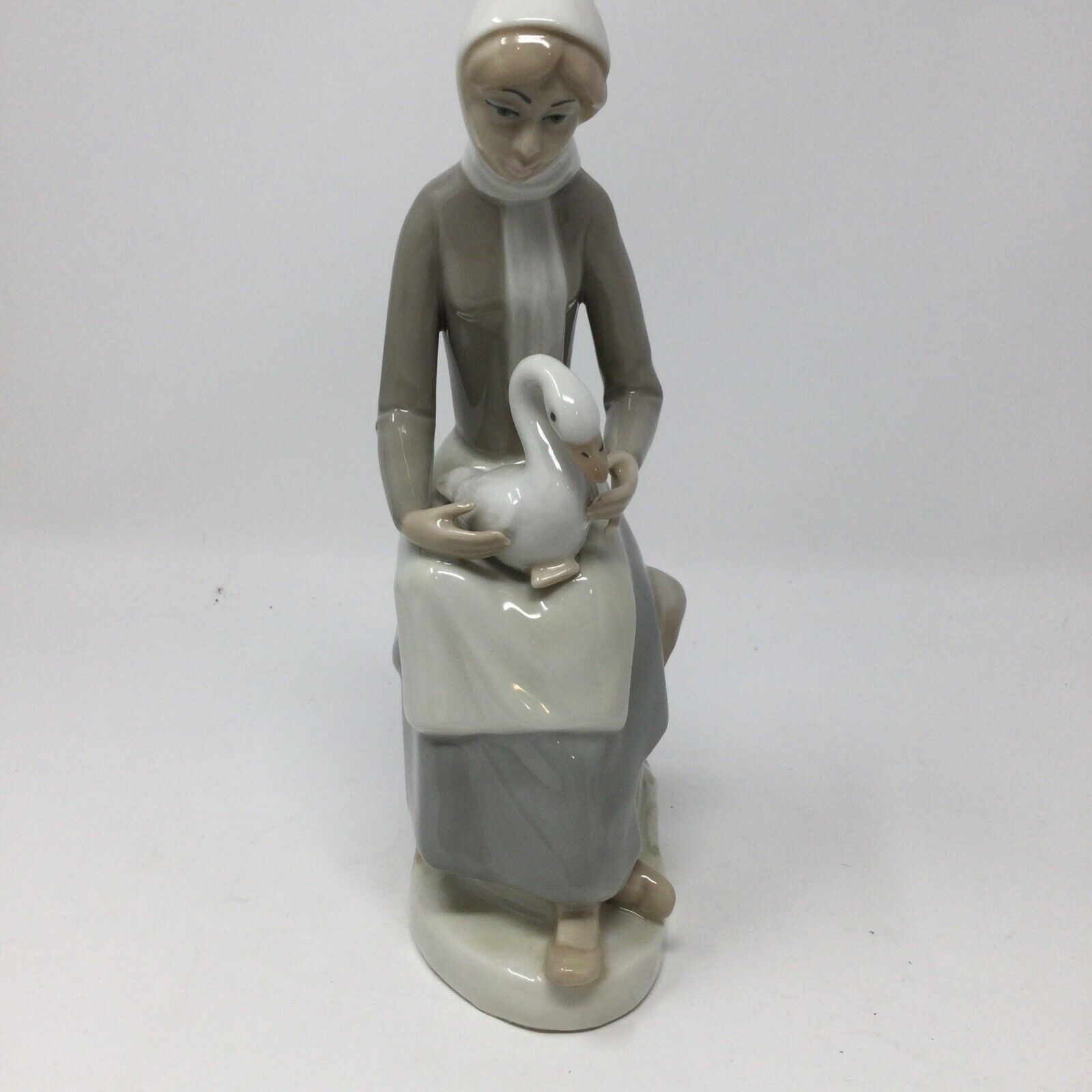 Casades Porcelain Figurine Lady With Goose. Approximately 9”. Spain