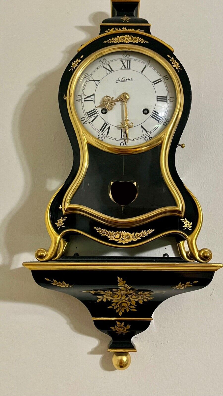 Antique wooden wall clock with pendulum Le Castel Works