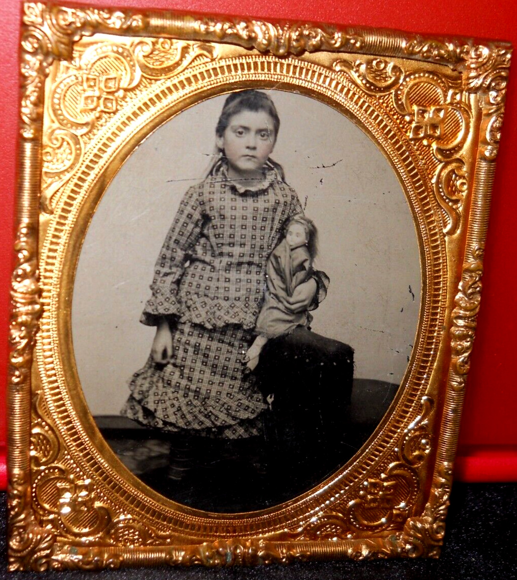 1/6th Size Tintype of young girl and doll in brass mat/frame