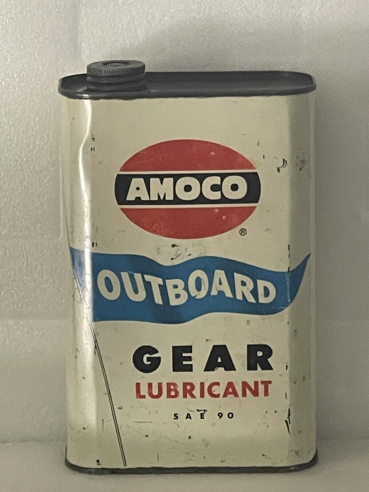 Amoco outboard motor oil can,vintage from the 1950s with graphics,fair shape.