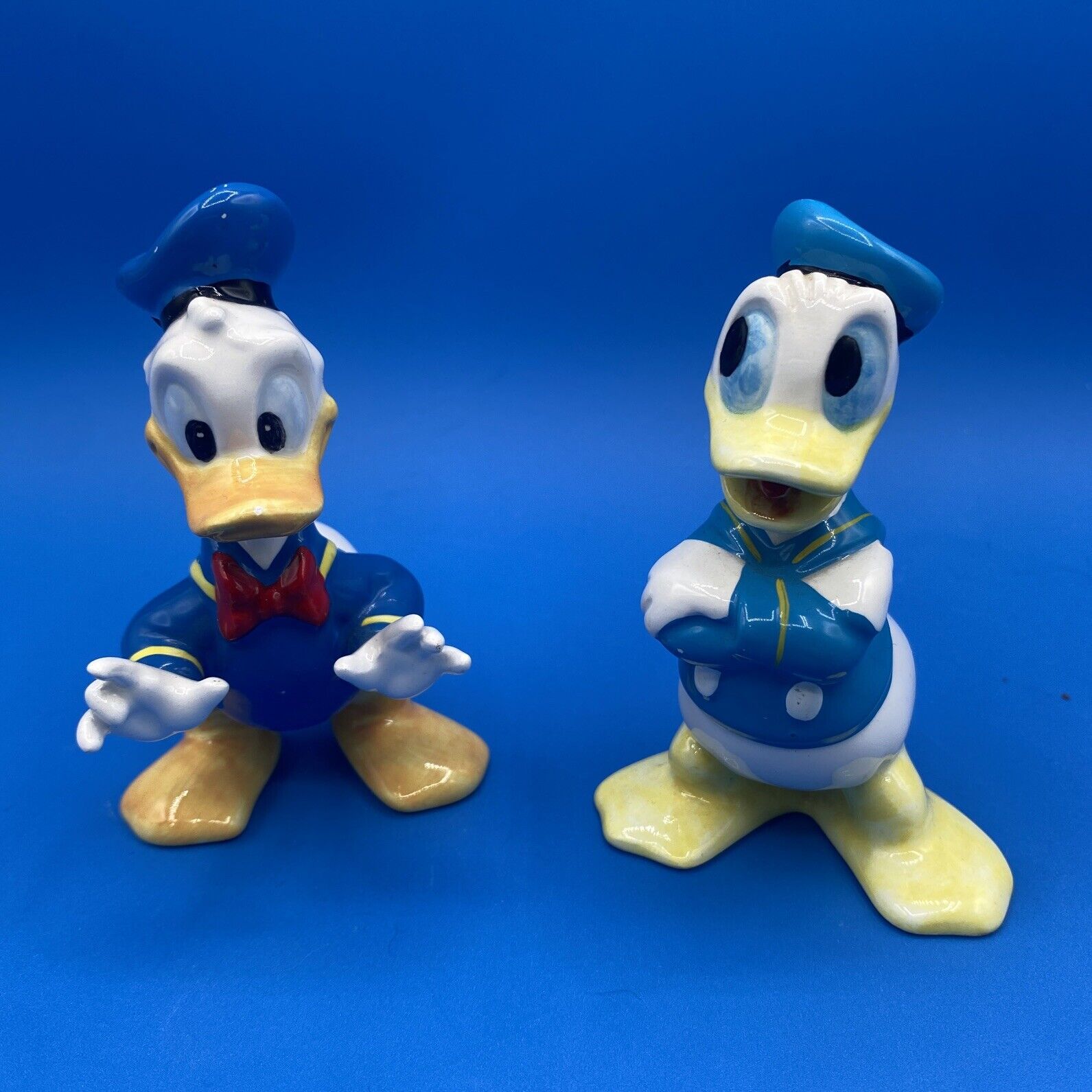 Set Of 2 Vintage Walt Disney Productions Ceramic Donald Duck Figurines