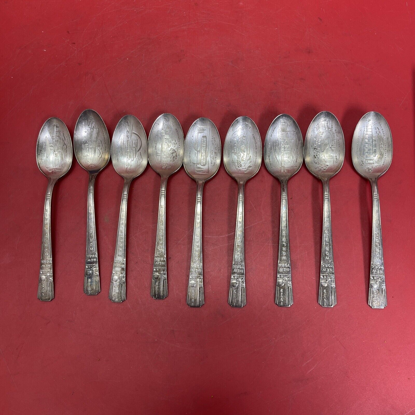 1939 NEW YORK WORLD'S FAIR Lot Of 9 souvenir spoons WM.ROGERS MFG CO SILVERPLATE