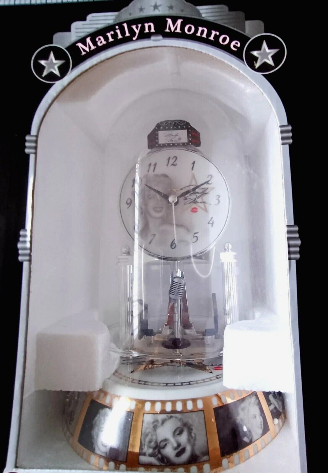 Marilyn Monroe porcelain Spinning Pendulum Clock.