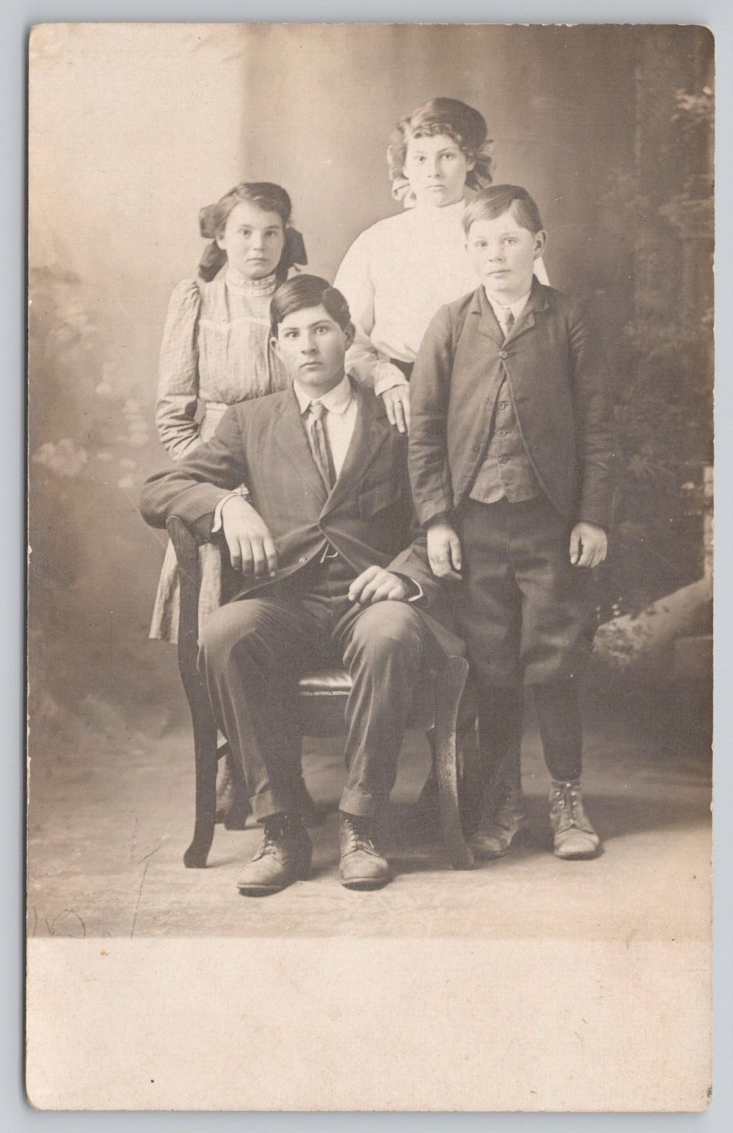 Postcard Portrait of Four Children Dressed Up in Sunday Clothes, Vintage RPPC