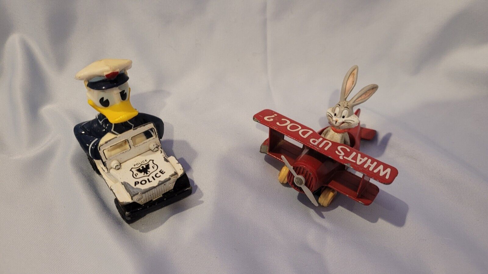 Vtg '79 Matchbox Donald Duck Policeman & '88 Ertl Bugs Bunny Airplane Diecast 