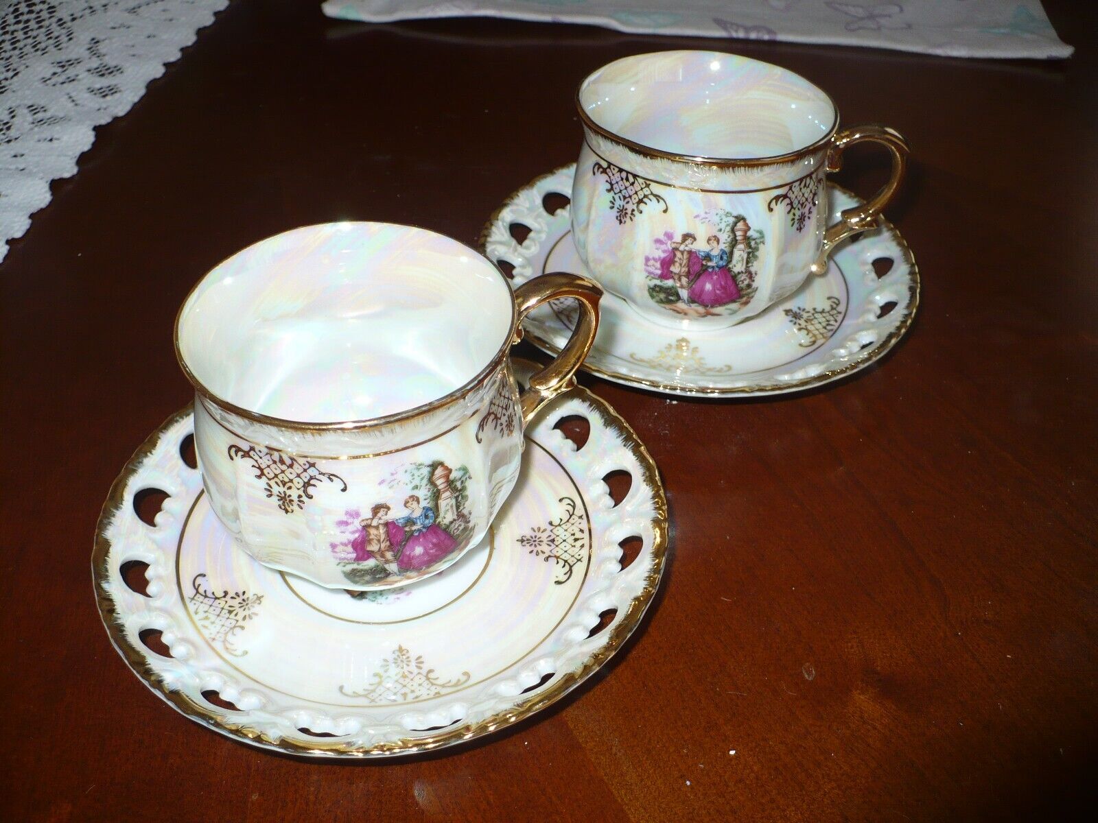Pair of Royal China lustreware cup and saucer