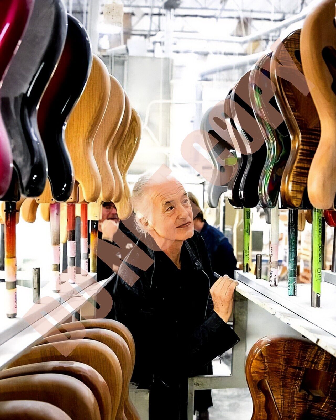 Jimmy Page From Led Zeppelin Looking At Guitars In Music Store 8x10 Photo
