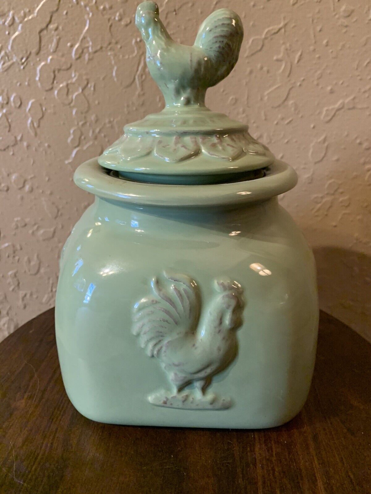 Vintage Green Ceramic Cookie Jar W/Roosters & Lid with a seal. Used. No chips