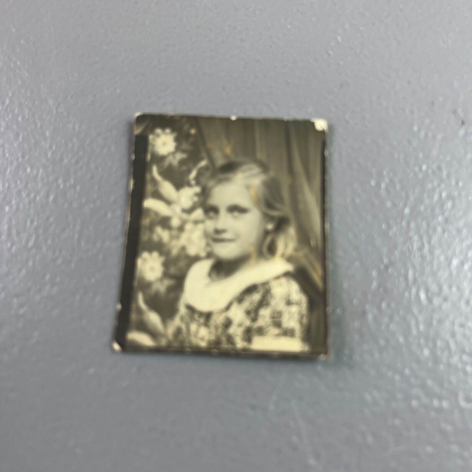 Vintage Photo Booth Young girl Blonde Mischievous Look Victorian Background
