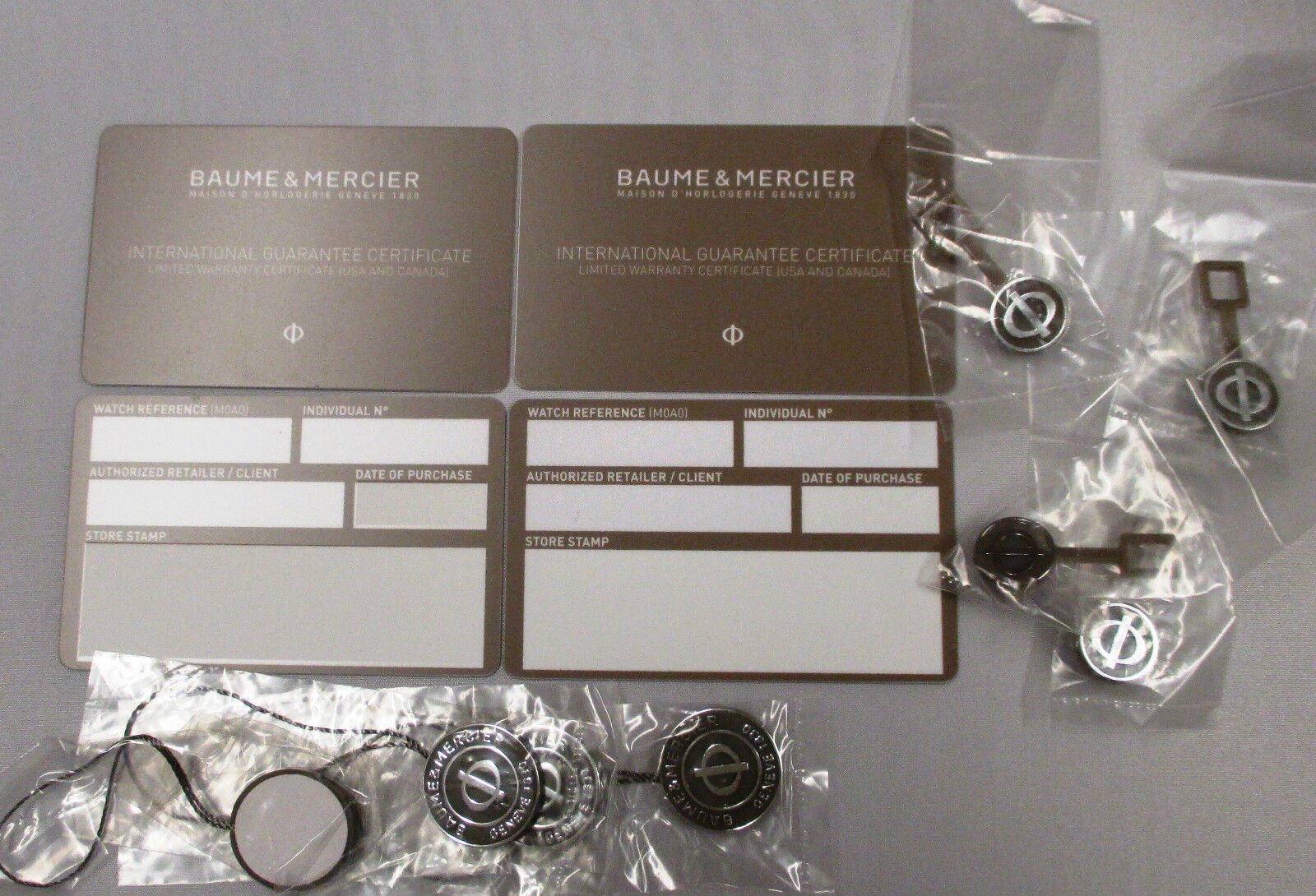 4 Baume & Mercier Watch Guarantee and Limited Warranty Certificate Cards & Tags