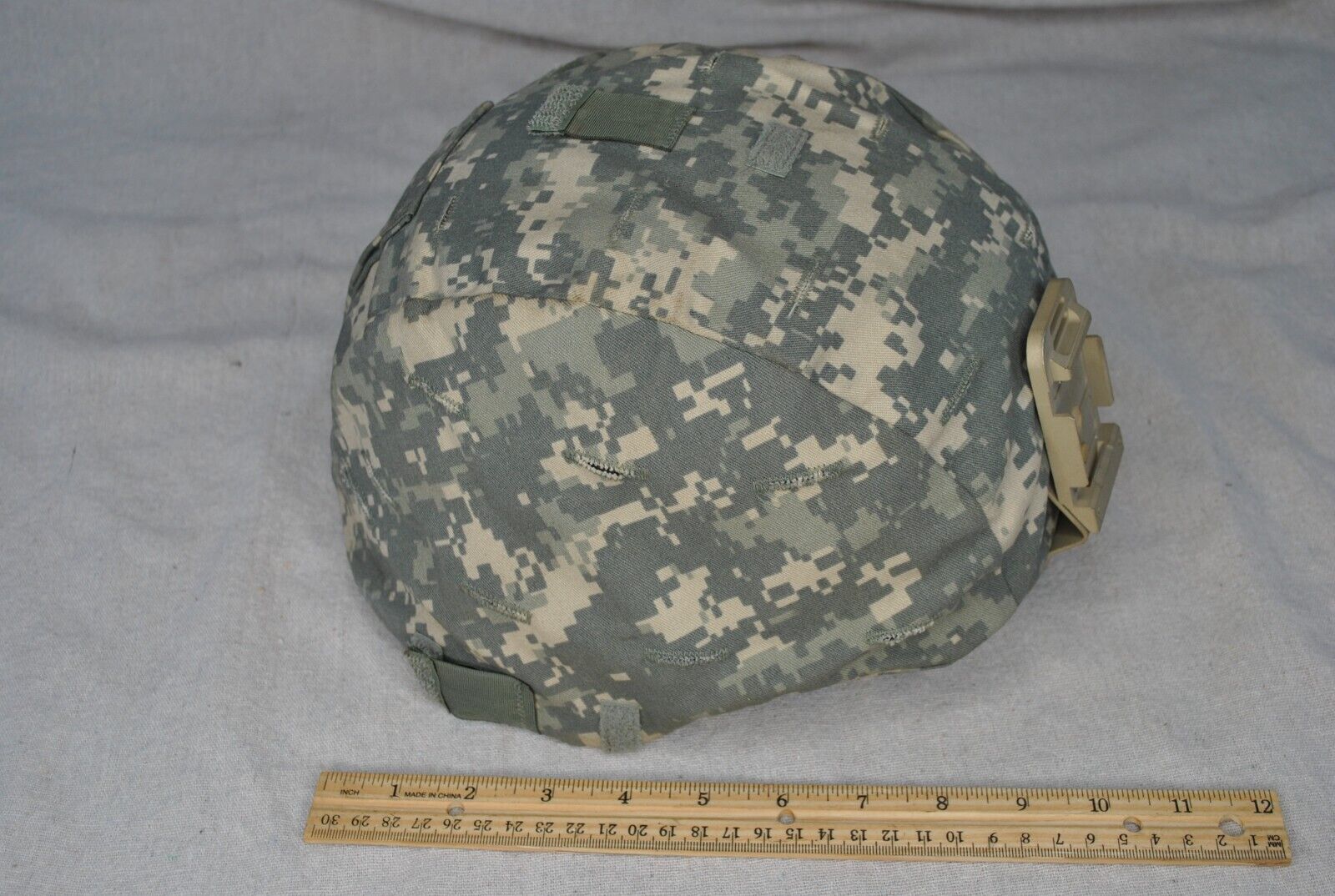 msa US Military helmet size large with camouflage cover