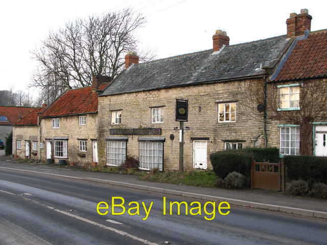 Photo 6x4 Blacksmith\'s Arms Pickering Restored in 1893 but no longer open c2009