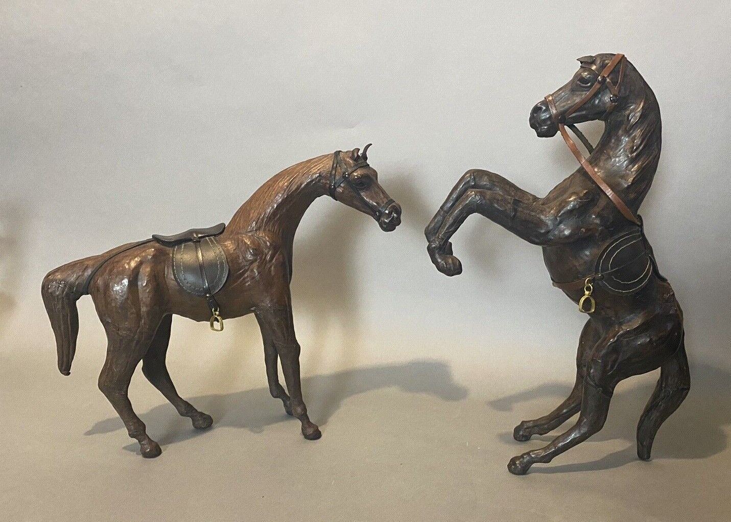 PAIR OF VINTAGE ANTIQUE WRAPPED TOOLED LEATHER FIGURAL HORSE STATUE FIGURES