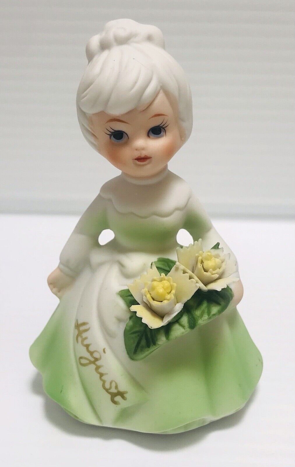 Vintage Lefton Green August Birthday Girl With Flowers 4”