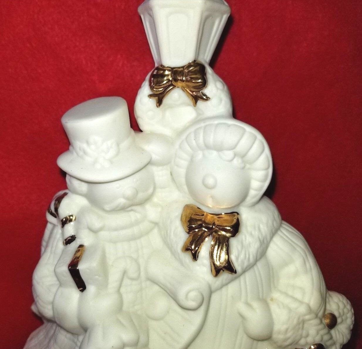 MADISON AVENUE BISQUE SNOWMAN FAMILY MUSICAL WITH GOLD ACCENT