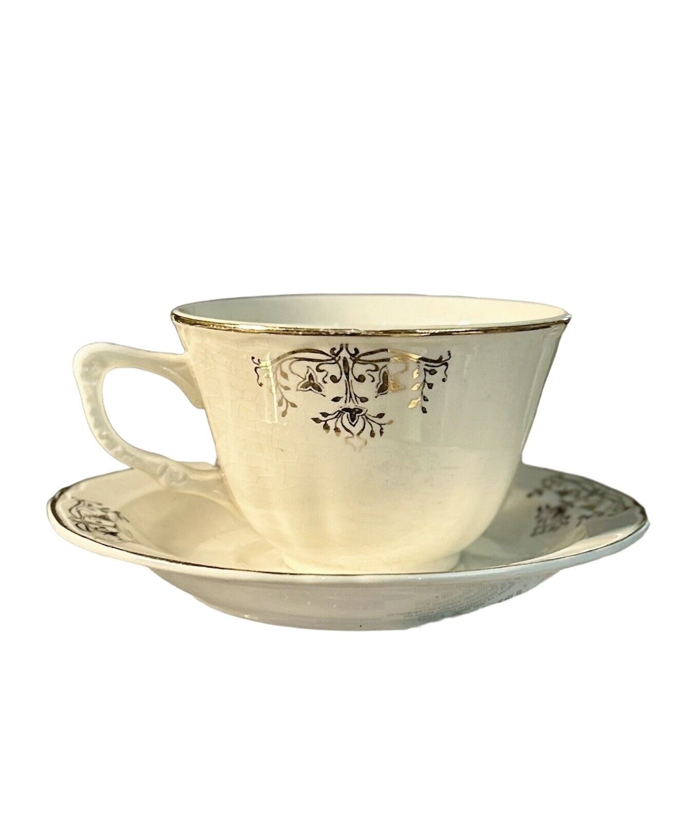 Antique Crown And Ivory Cup And Saucer